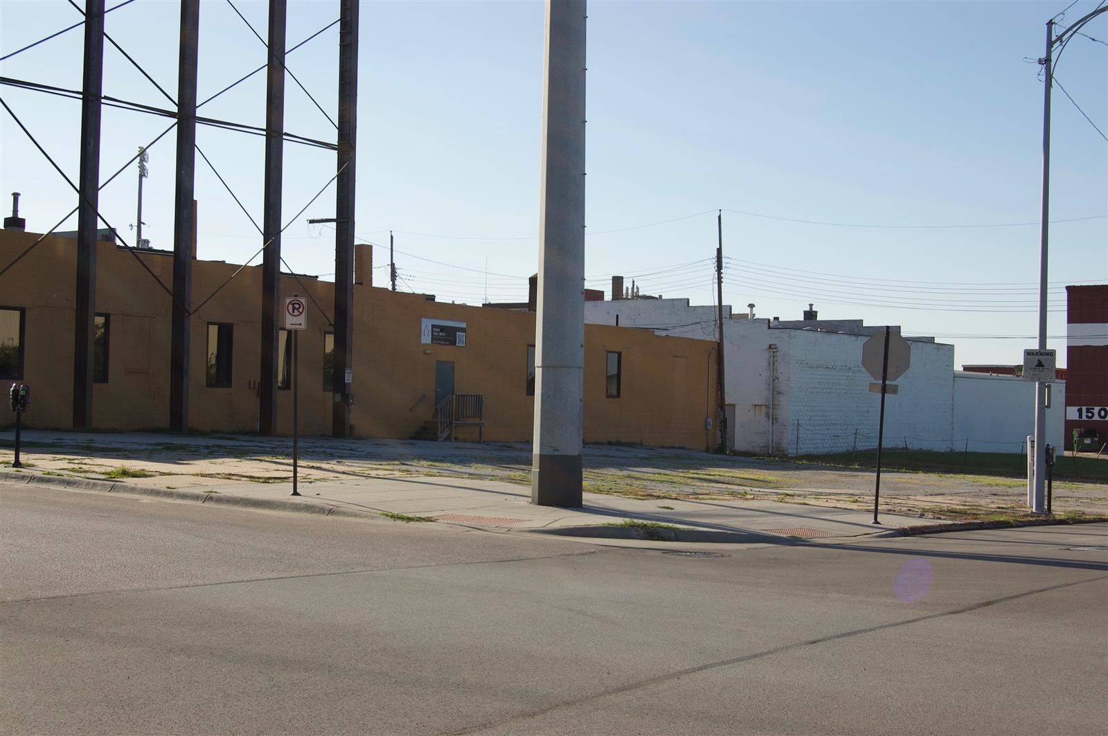 Modern image of industrial area with buildings and empty lots